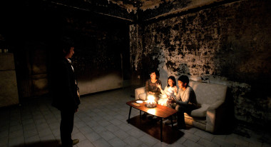 "Stray Dogs:" Lee Kang-sheng, standing; hostess; Lee Yi-chieh; Lee Yi-cheng; photo: William Laxton