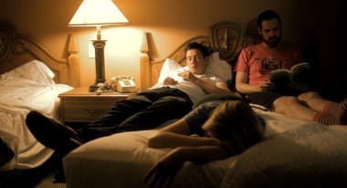 Alex, Jane and Russell rest in a Motel bedroom.