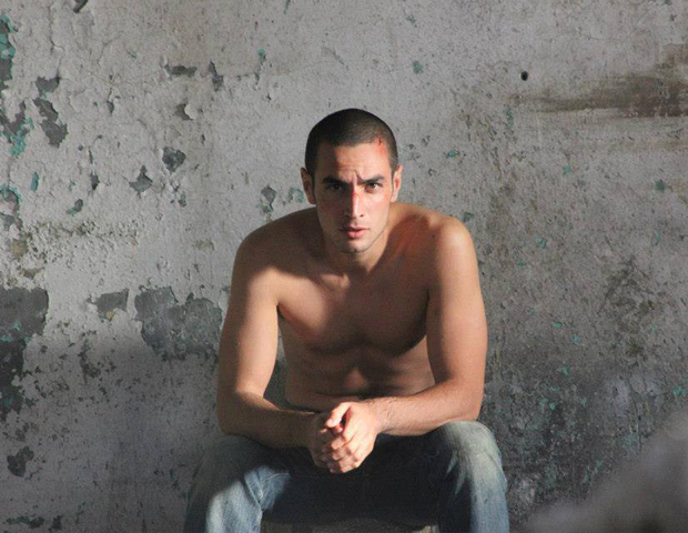 Omar (Adam Bakri) in Hany Abu-Assad's film. Image courtesy Adopt Films.