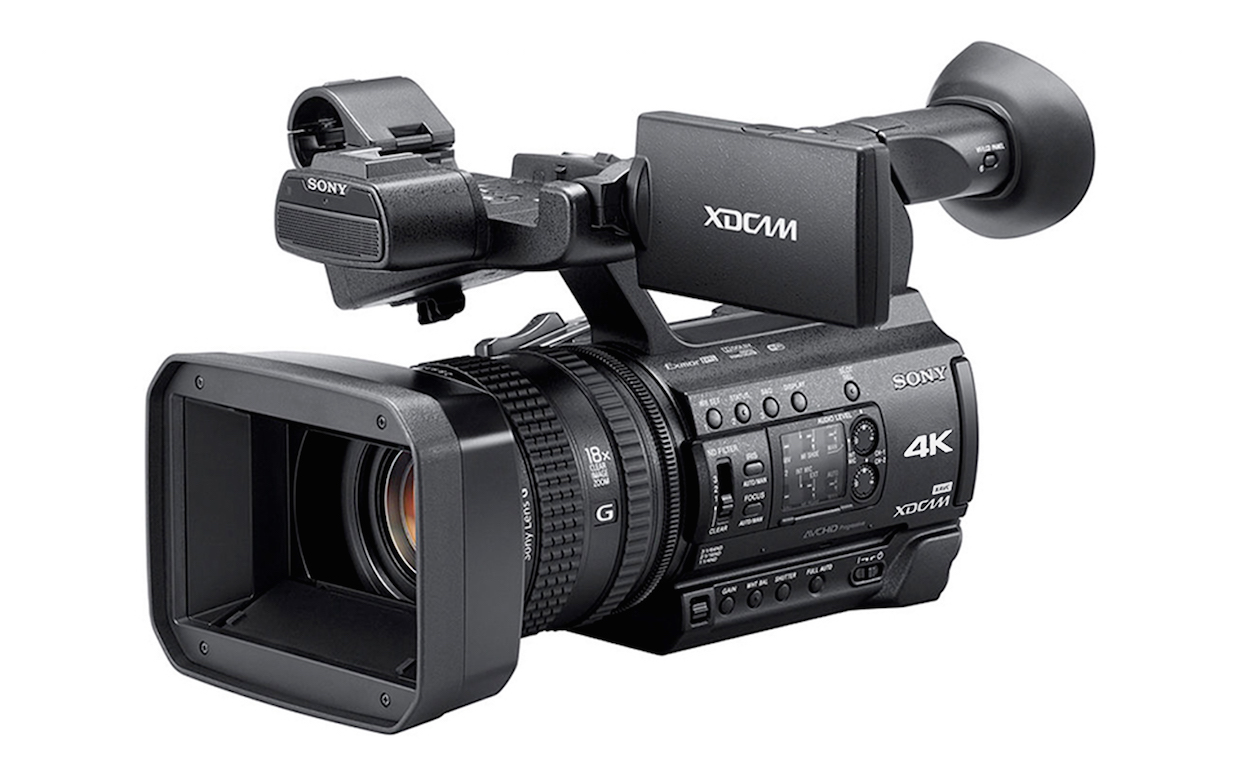 Sony’s new PXW-Z150 looks like a conventional Handycam but don’t let that fool you. A single 1-in. sensor captures 3840 x 2160 to 30p (8-bit), HD to 120 fps (10-bit) using Long-GOP XAVC. Its 12x G Lens Zoom is amplified 2x by Clear Image Zoom for a clean 24x zoom (or 48x with Digital Zoom). Focus, zoom and iris rings are separately controlled. No S-Log, but a 00 street price positions this as a terrific, affordable documentary workhorse.