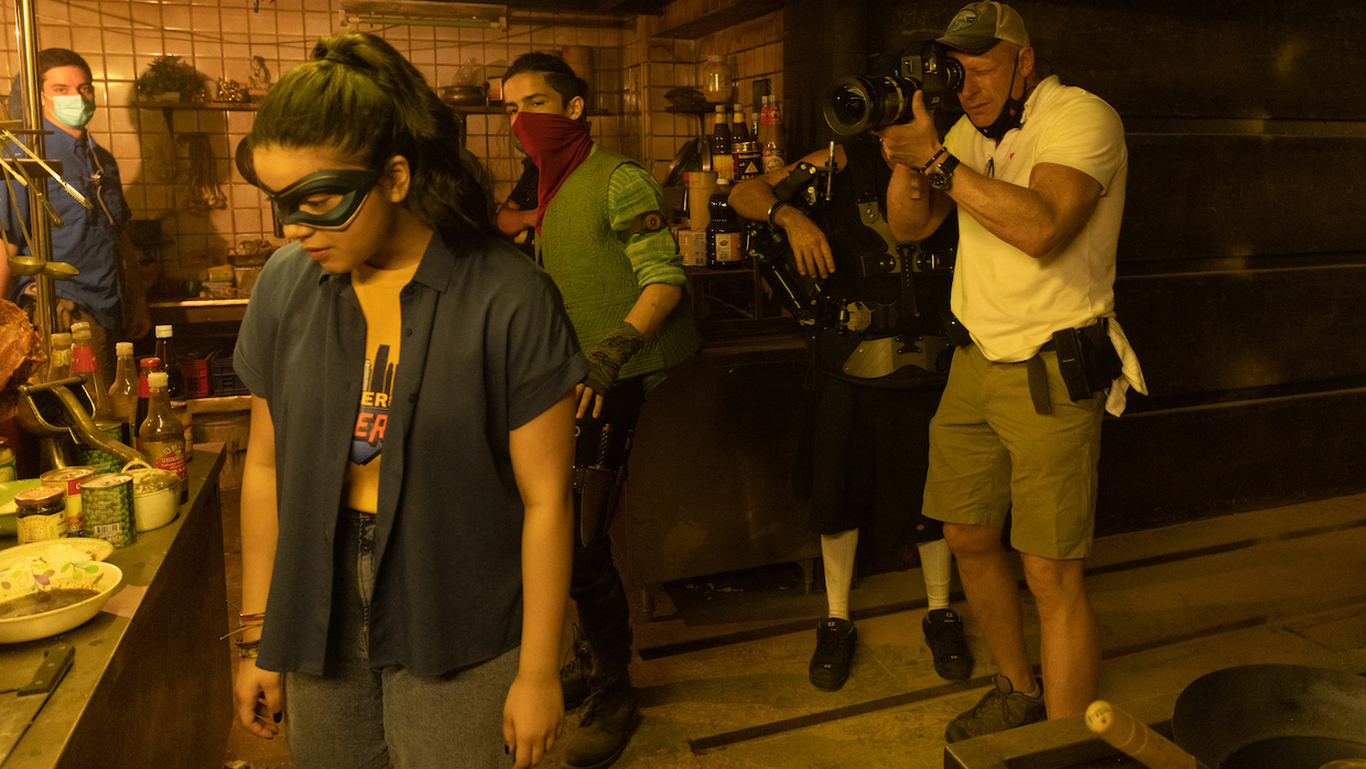 Jules O'Loughlin lines up a shot on the set of Ms. Marvel.