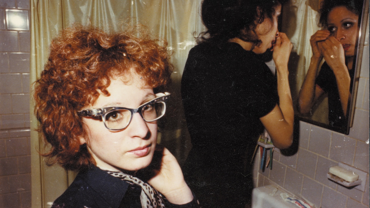 Nan Goldin in the bathroom with roommate, Boston (courtesy of Nan Goldin)