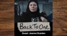 A still of actress Joanna Scanlan. a middle-aged white woman wearing a hijab, in the film After Love, with the words "Back To One" written over the image in what appears to be marker on packing tape. The image is placed on a wooden tabletop.