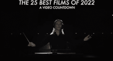 Cate Blanchett conducts an orchestra as Lydia Tár, a banner above her reads "The 25 Best Films of 2022: A Video Countdown."