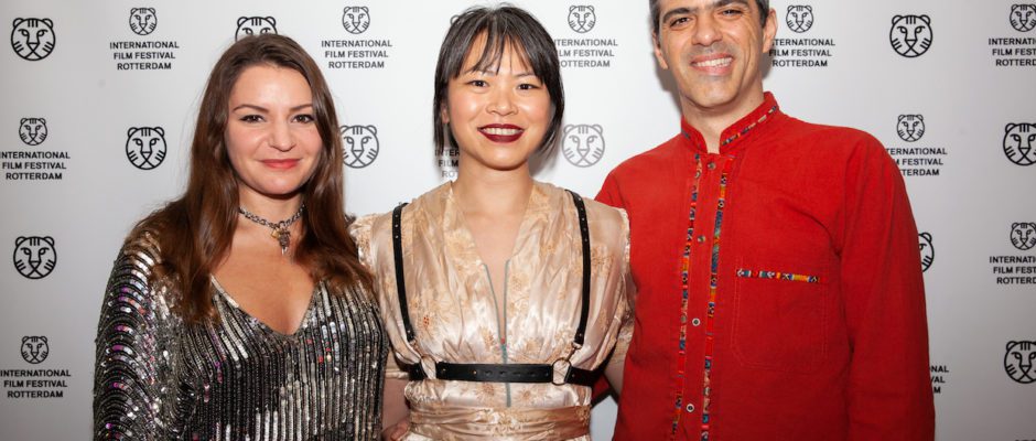 Samara Bliss, Winnie Cheung and Dan Rosato pose on the red carpet at IFFR 2023.