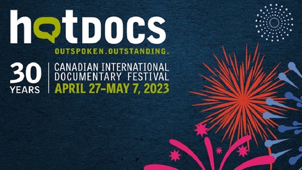 A logo for Hot Docs that features cartoon fireworks superimposed over a dark blue background.