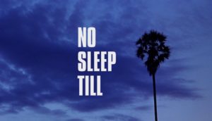 A single palm tree is captured amid a stormy, purple sky. Text to the left of the palm tree reveals a title card: No Sleep Till.