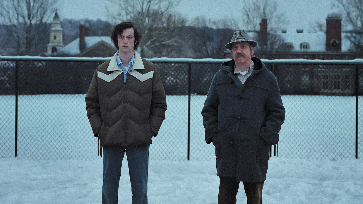 Dominic Sessa as Angus Tully and Paul Giamatti as Paul Hunham in Alexander Payne's The Holdovers