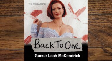 A director and actor, Leah McKendrick, of the film "Scrambled": a white woman with red hair in a purple gown.