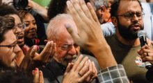 A group of churchgoers pray.