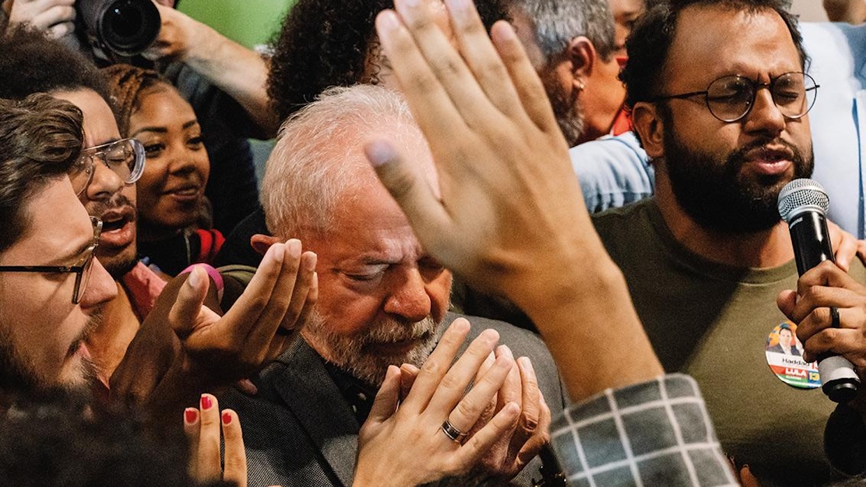 A group of churchgoers pray.