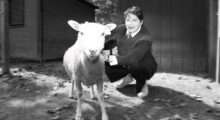 A woman and a sheep.