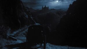 A carriage drives towards a gloomy castle on a moonlit night.