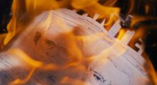 A paper with a sketch of the Zodiac Killer is ablaze.