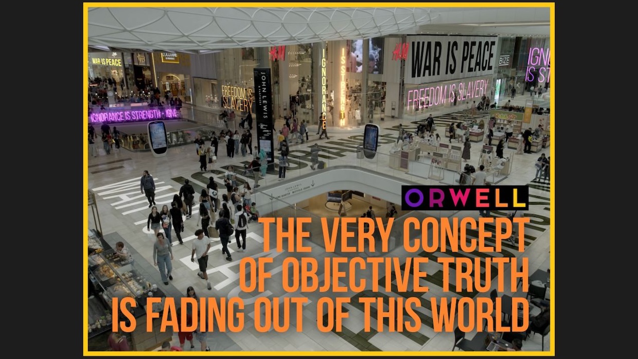Orwell_ 2+2=5 - Still | Filmmaker Magazine A meme-like image of a mall with George Orwell quotes all over it.